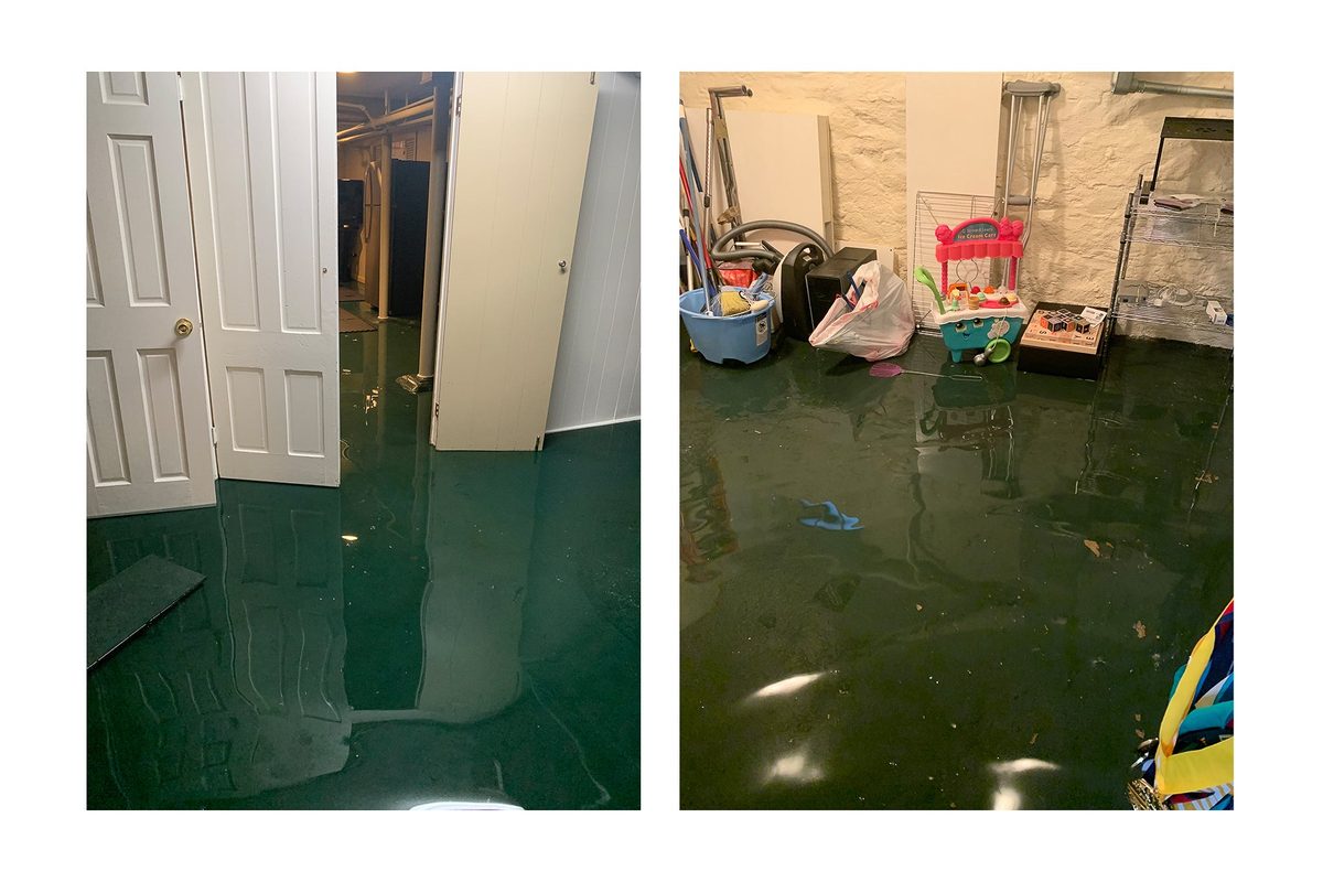 Flooded basement floor with standing water before water removal